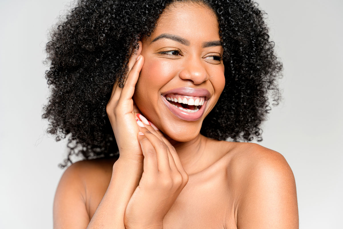 An African-American Woman smiles