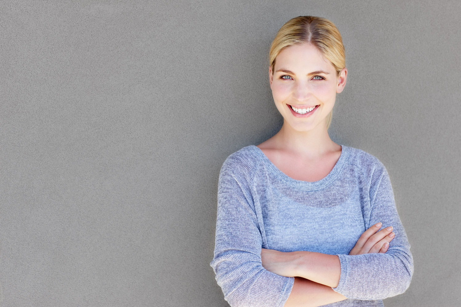 A woman happy with her laser hybrid results