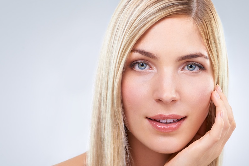 A closeup of a woman smiling